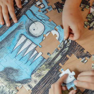 Puzzle 100 piezas Artistas Rompecabezas x Liniers - Olga en el bosque