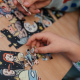Puzzle 100 piezas Artistas Rompecabezas x Liniers - Mundo Macanudo